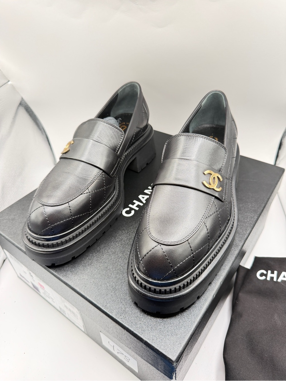 Chanel 23A Black Calfskin Leather Quilted CC Gold Logo Flat Platform Loafer 39